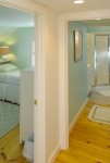 2nd floor hall to the shared guest bathroom and another bedroom with 2 Twin beds